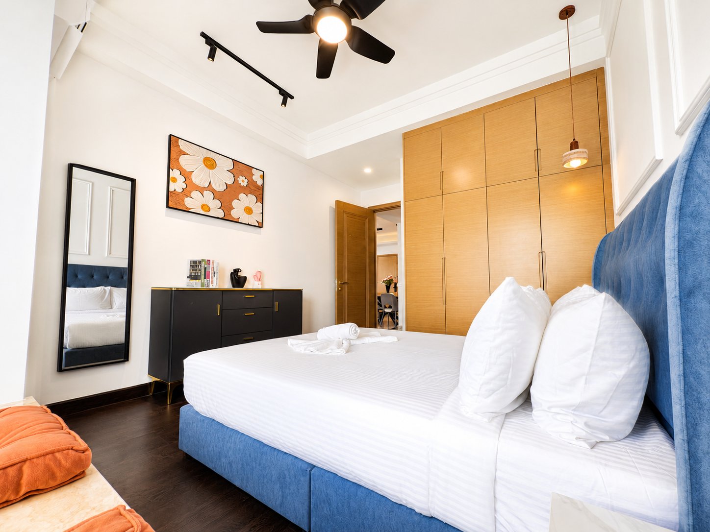 ANJU guest-ready bedroom setup with blue bed